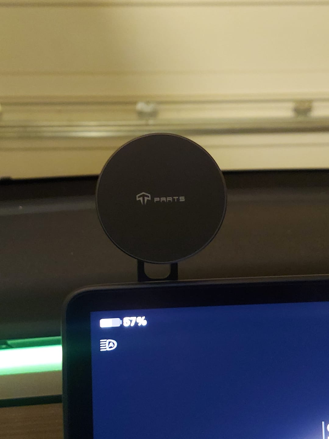 Customer photo review of Foldable Magnetic Wireless Charging (Qi & MagSafe)  Cell Phone Holder for Tesla