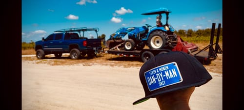 Customer photo review of Blue & White Universal License Plate Hat
