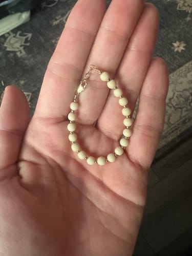 Customer photo review of Mommy & Me Gold & Tan Bracelet - 14K Gold Filled