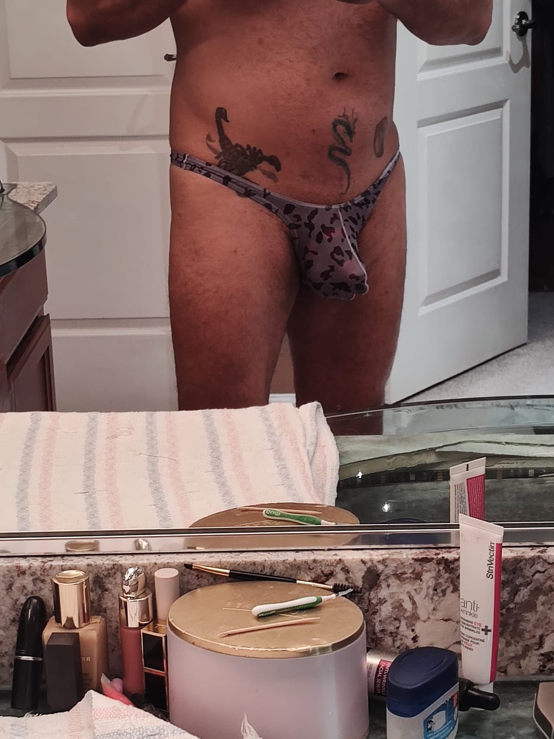 Customer photo review of 4 Pack Leopard Print See-through Mesh Thongs