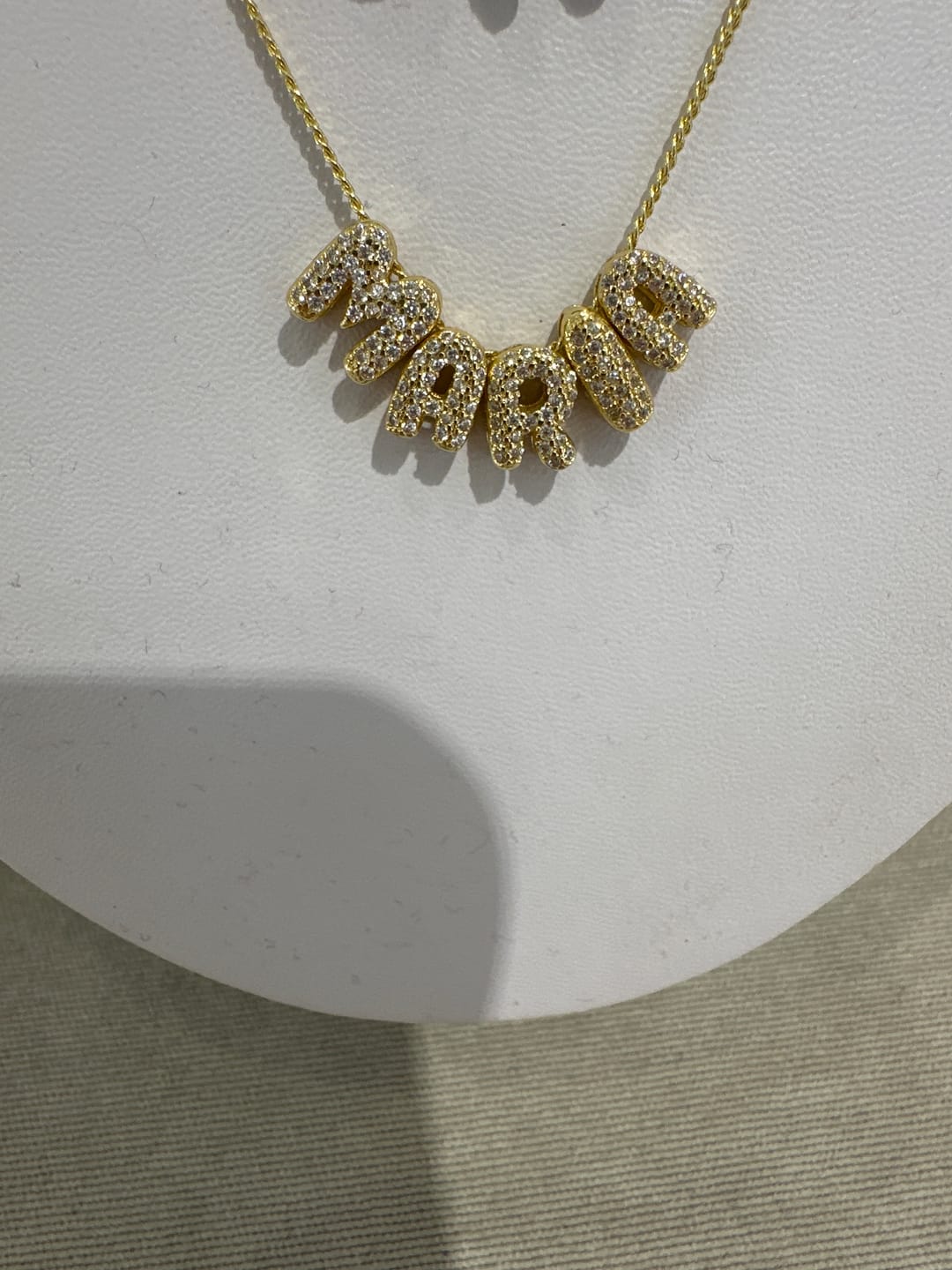 Customer photo review of Personaliza Tu Collar Con Inicial Mini Bubble Combinado Zirconias