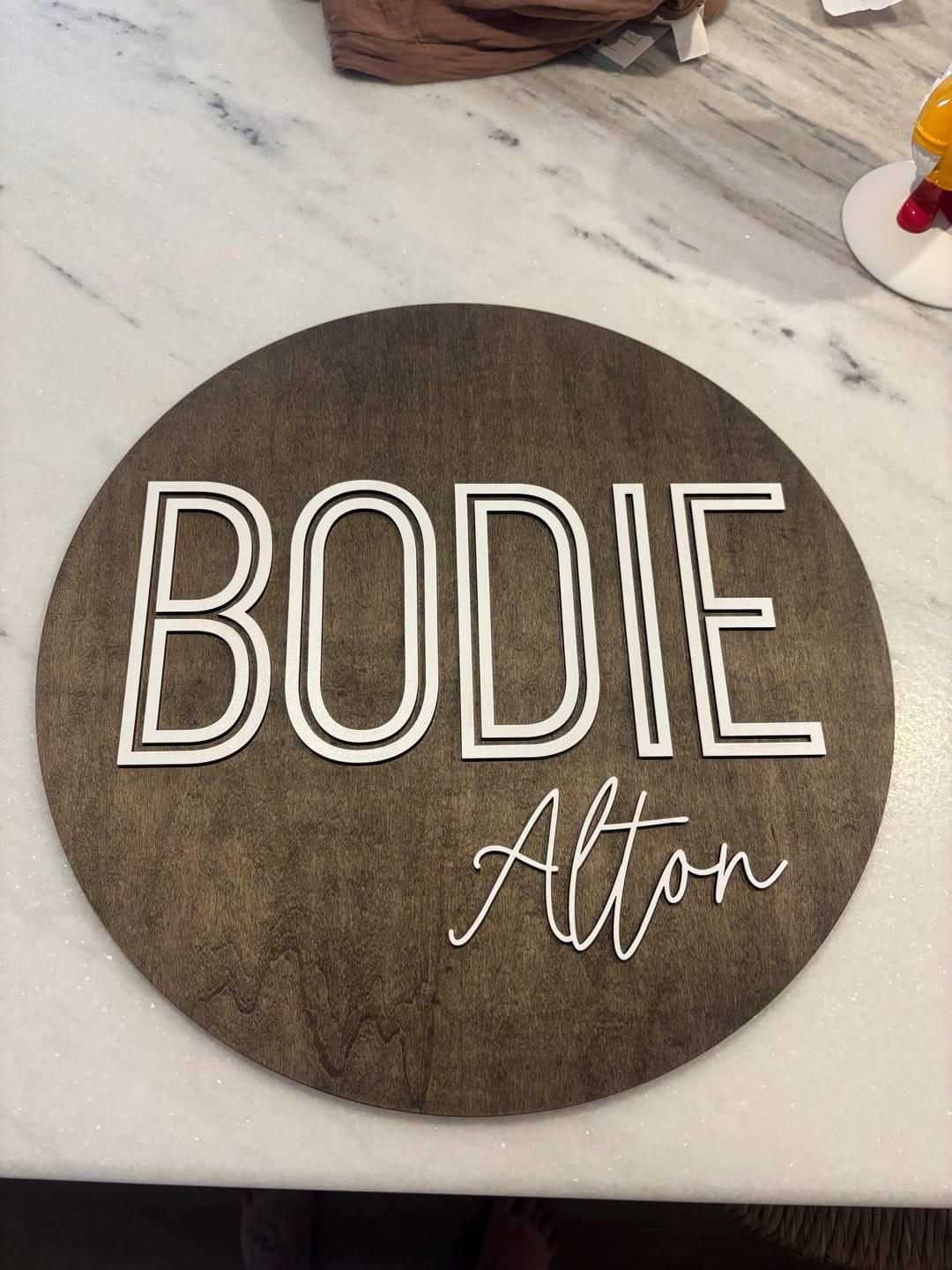 Customer photo review of Round Nursery Name Sign