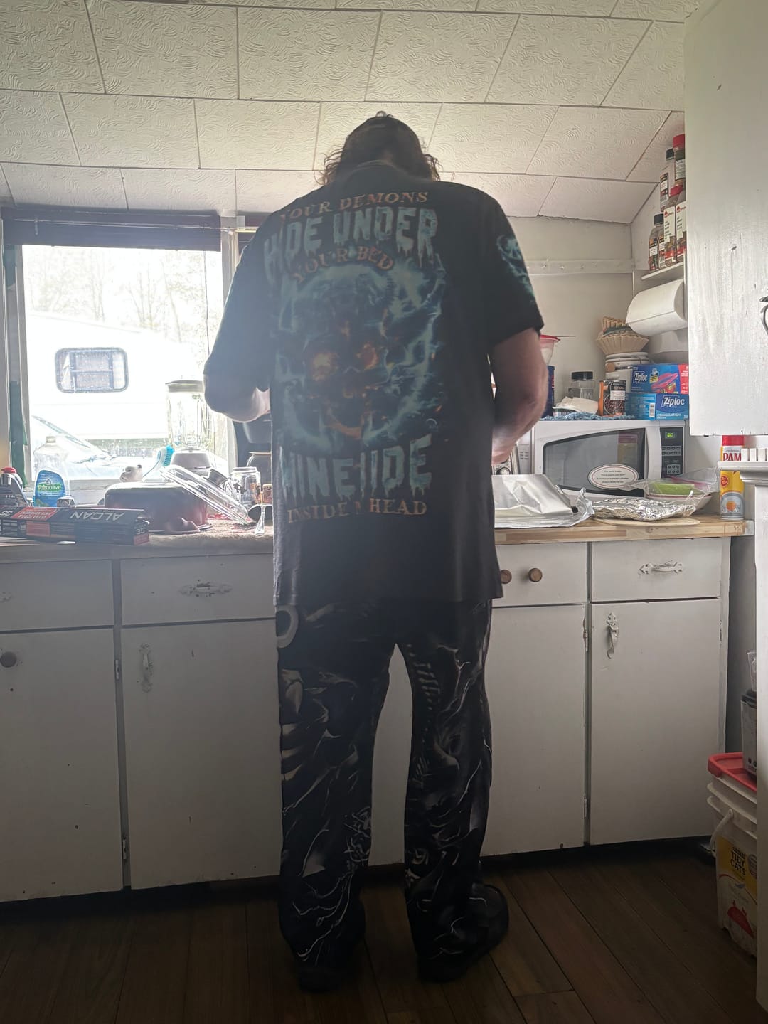 Customer photo review of YOUR DEMONS HIDE UNDER YOUR BED SKULL ALL OVER PRINT - TLNO0304241