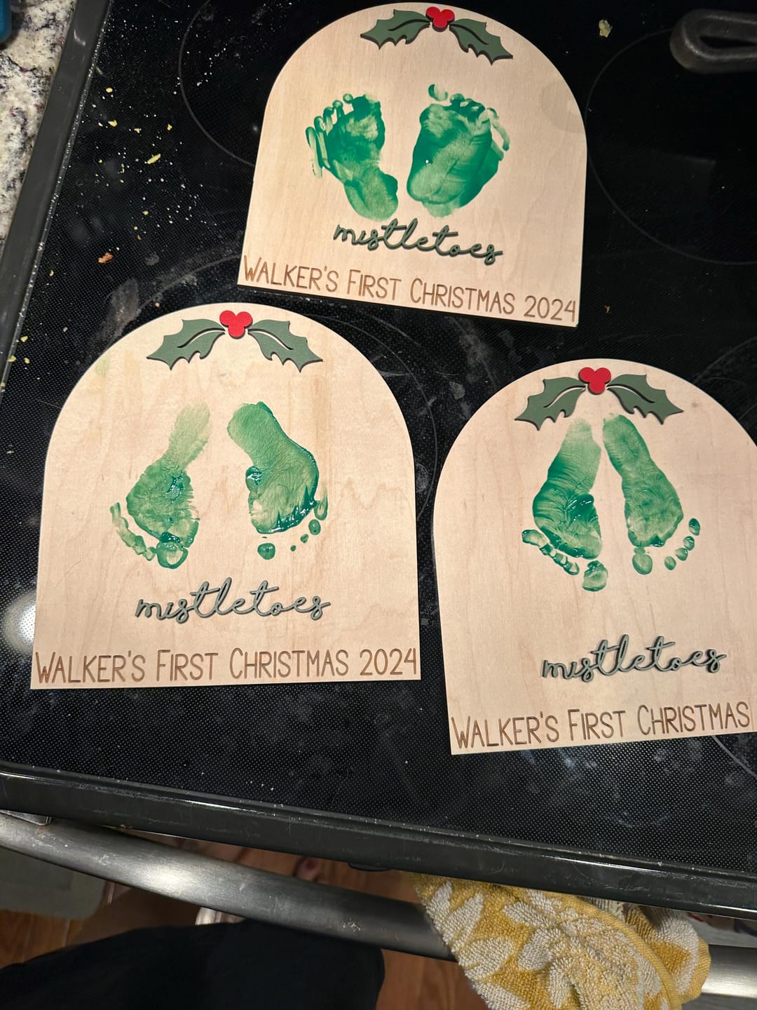 Customer photo review of Baby's First Christmas Mistletoe Footprint Craft