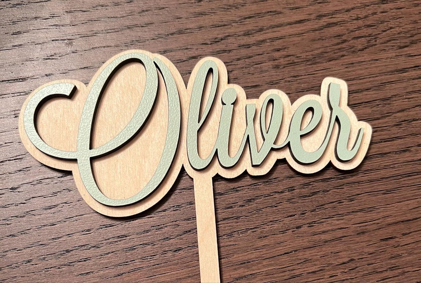 Customer photo review of Name Cake Topper