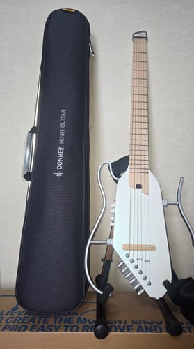 undefined review of Donner HUSH-I PRO トラベルエレアコギター - 18種類のエフェクト軽量ポータブル ヘッドレスデザイン image 1 out of 1