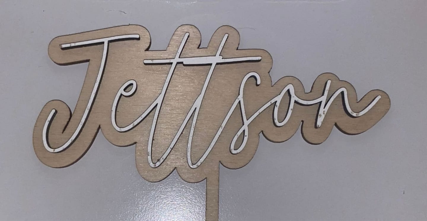 Customer photo review of Name Cake Topper
