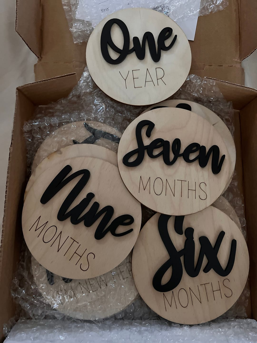 Customer photo review of Wooden Monthly Baby Milestones