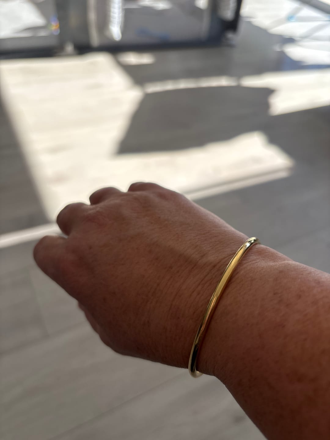 Customer photo review of Solid Golf Bangle 3mm Gold Layered