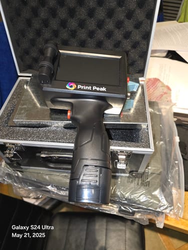 Customer photo review of PrintPeak Mini Handheld Inkjet Printer