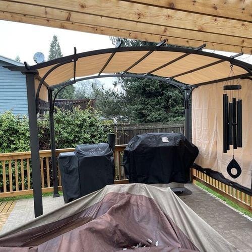 Customer photo review of SUNJOY Outdoor Patio 9.5x11 Modern Tan Metal Arched Pergola Kit with Adjustable Canopy