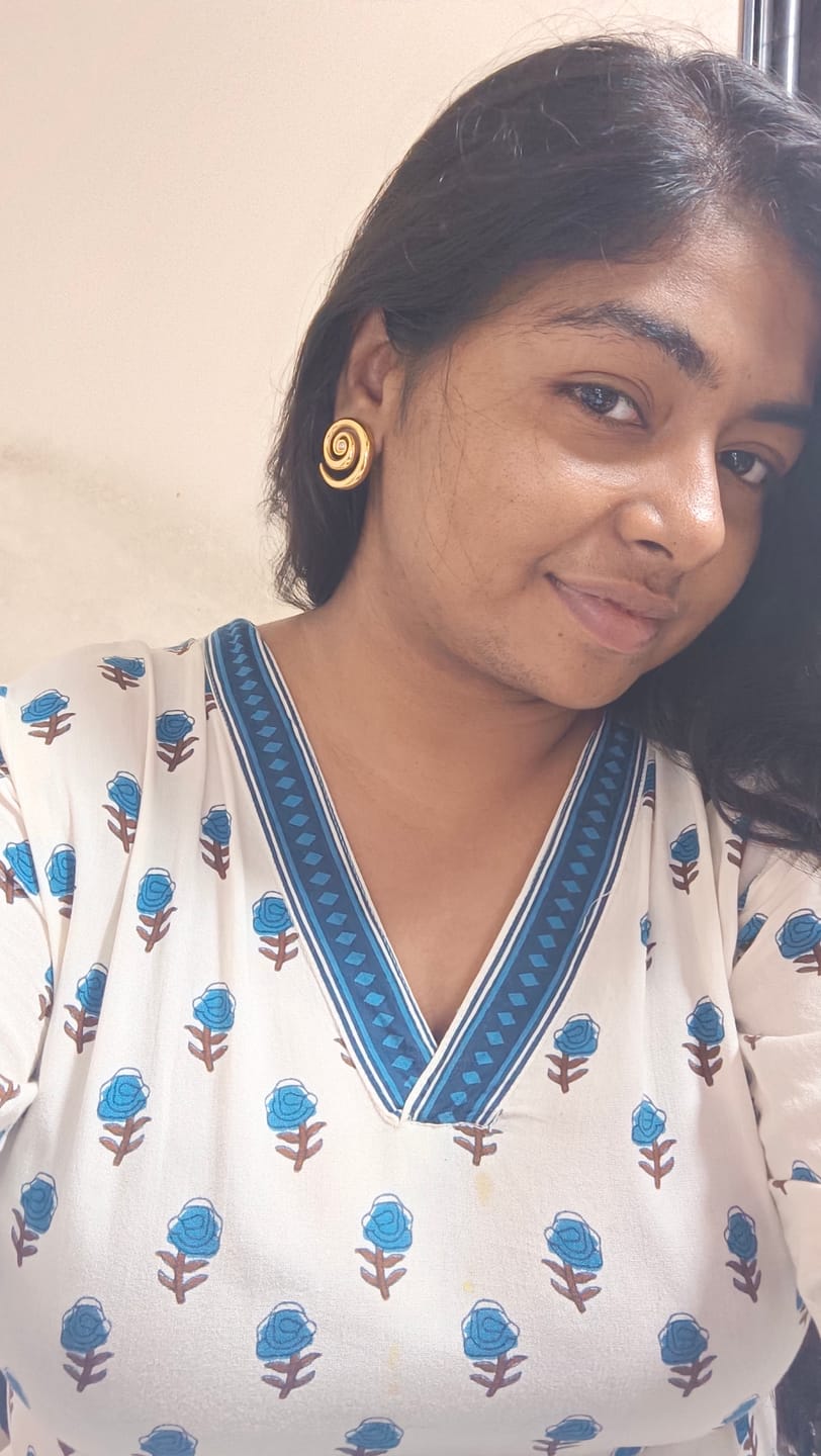 Customer photo review of Cosmic Swirl Earrings