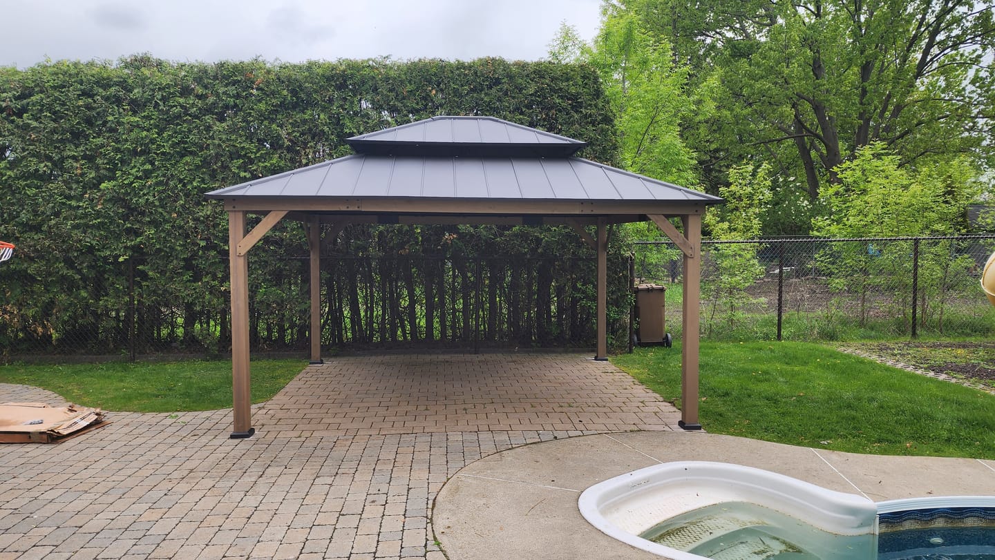 Customer photo review of SUNJOY Outdoor Patio 13' x 15' 2-Tier Wooden Frame Backyard Hardtop Gazebo with Ceiling Hook