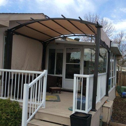 Customer photo review of SUNJOY Outdoor Patio 9.5x11 Modern Tan Metal Arched Pergola Kit with Adjustable Canopy