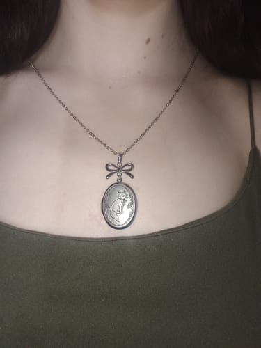 Customer photo review of TXT Member Locket Necklaces