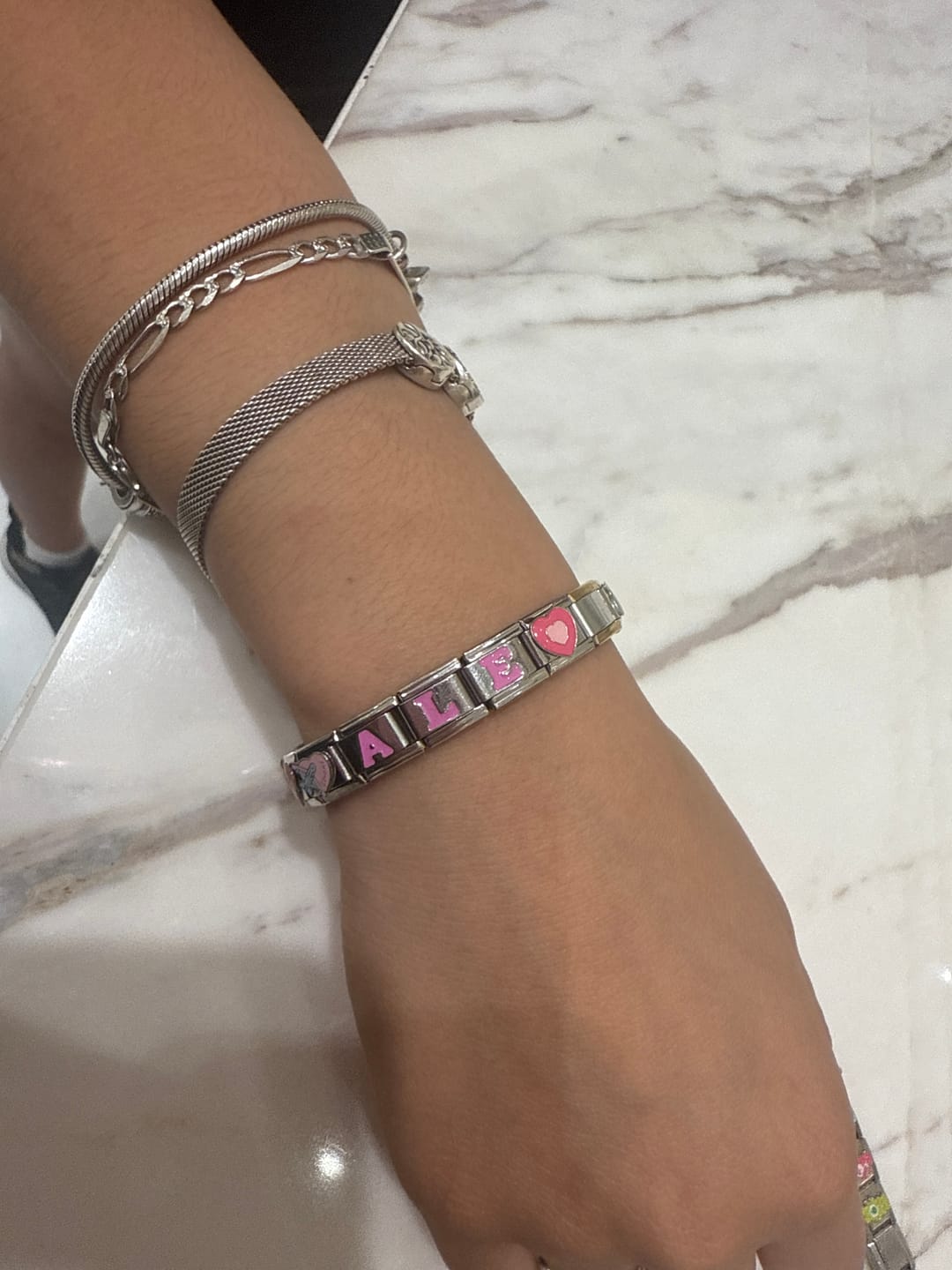 Customer photo review of Charm Inicial Rosa