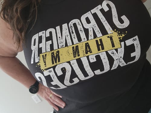 Customer photo review of Stronger Than Excuses Rocker Tank