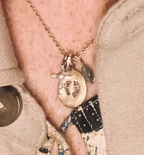 Customer photo review of Gold Baby's Footprints Oval Charm