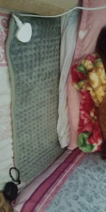Customer photo review of Electric Heating Therapy Pad