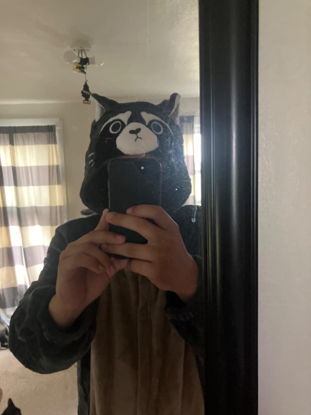 Customer photo review of OLAOLA Unisex Adult Plush Raccoon Animals Onesie Pajamas Warm Home One-Piece Sleepwear