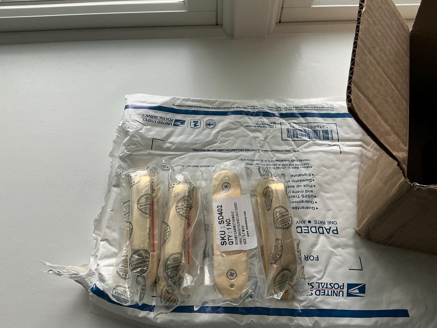 Customer photo review of Round Drawer Pulls with Backplate - Unlacquered Polished Brass
