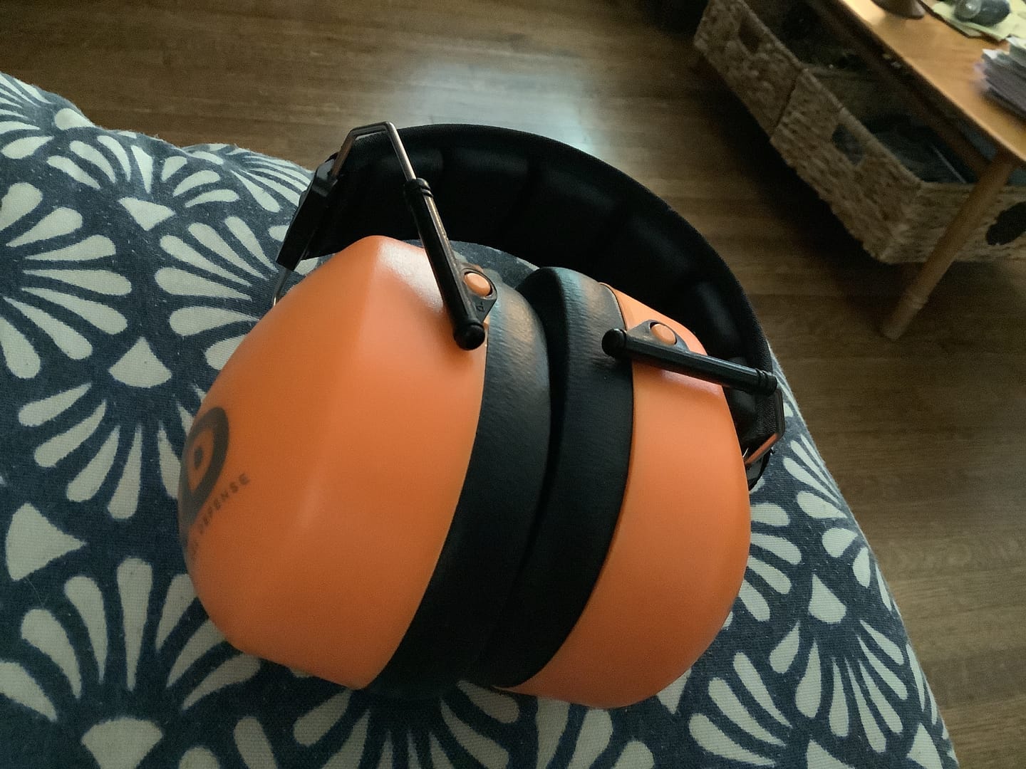 Customer photo review of Decibel Defense Safety Earmuffs in Hi-Visibility Orange