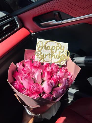 Customer photo review of Purple Rose Bouquet