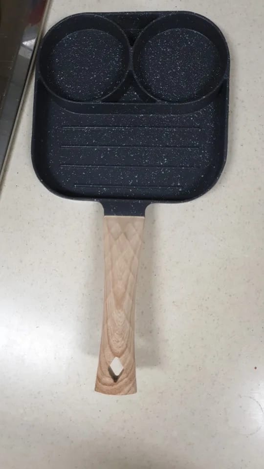 Customer photo review of LMETJMA Pancake Egg Frying Pan 4 Cups Omelet Poached Egg Pan for Breakfast Divided Coating with Non Sticking Handle JT888