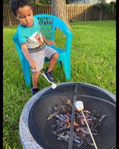 Customer photo review of SUNJOY 26 Inch Outdoor Fire Pits Wood Burning Patio Fire Pit Stone Backyard Fire Pit with Spark Screen and Poker