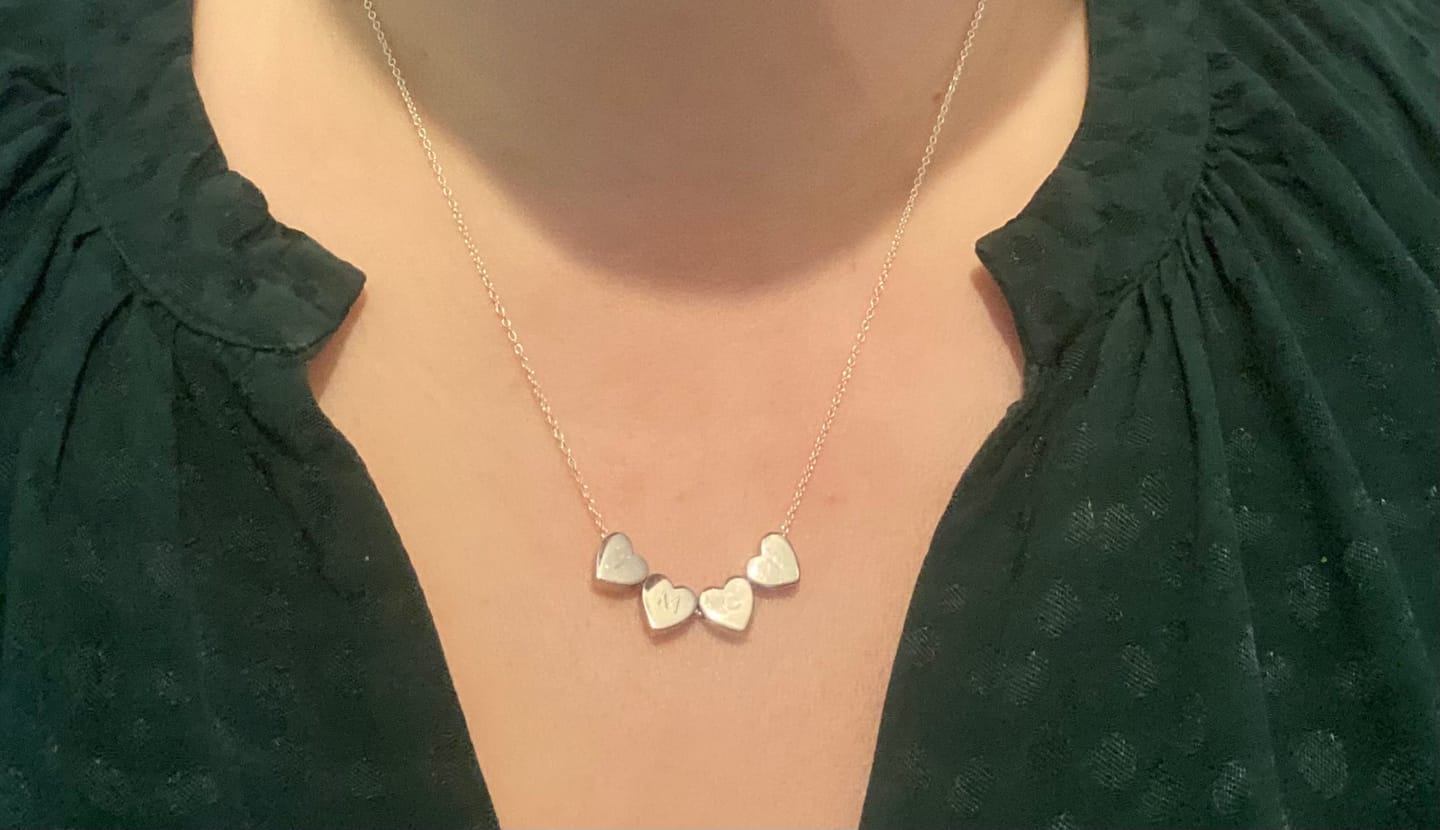 Customer photo review of Amo Heart Quadruple Bead Necklace in Silver