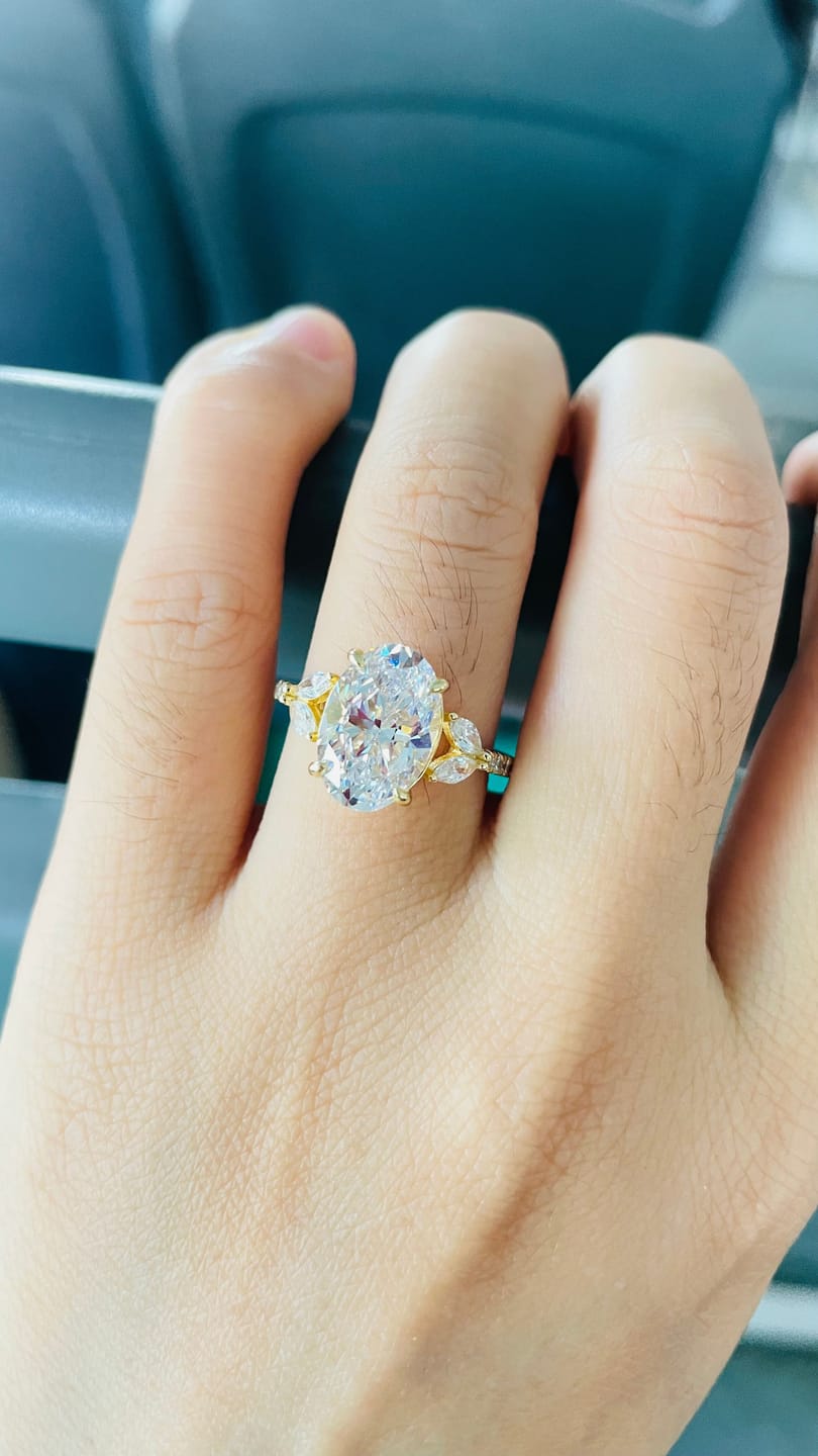 Customer photo review of Louily Sparkle Five Stone Yellow Gold Oval Cut Engagement Ring In Sterling Silver