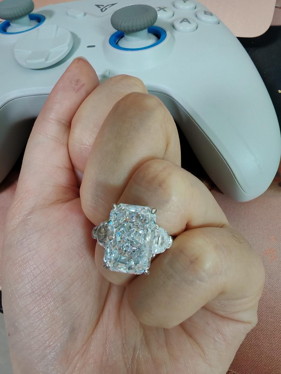Customer photo review of Louily Luxurious Crushed Ice Radiant Cut Three Stone Engagement Ring