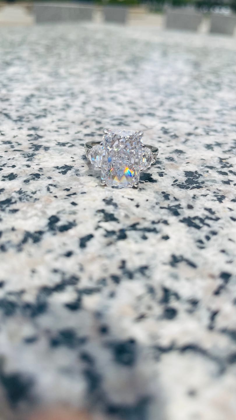 Customer photo review of Louily Luxurious Crushed Ice Radiant Cut Three Stone Engagement Ring