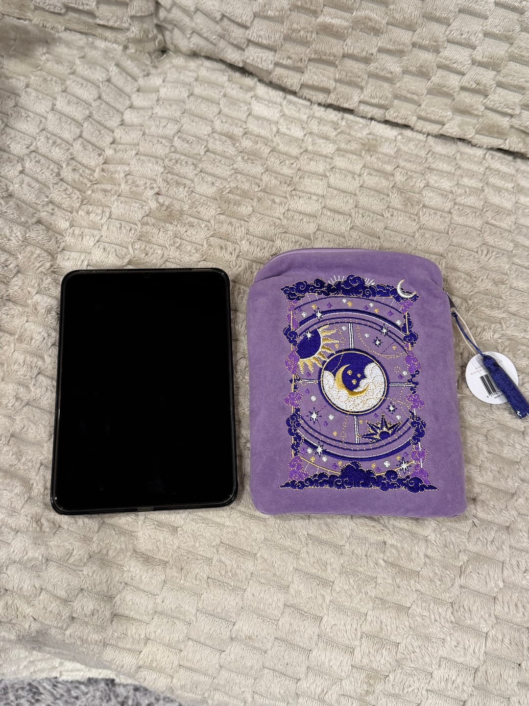 Customer photo review of Otherworldly E-Reader Sleeve - Lilac