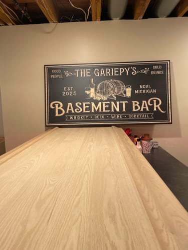 Customer photo review of Personalized Basement Bar Sign