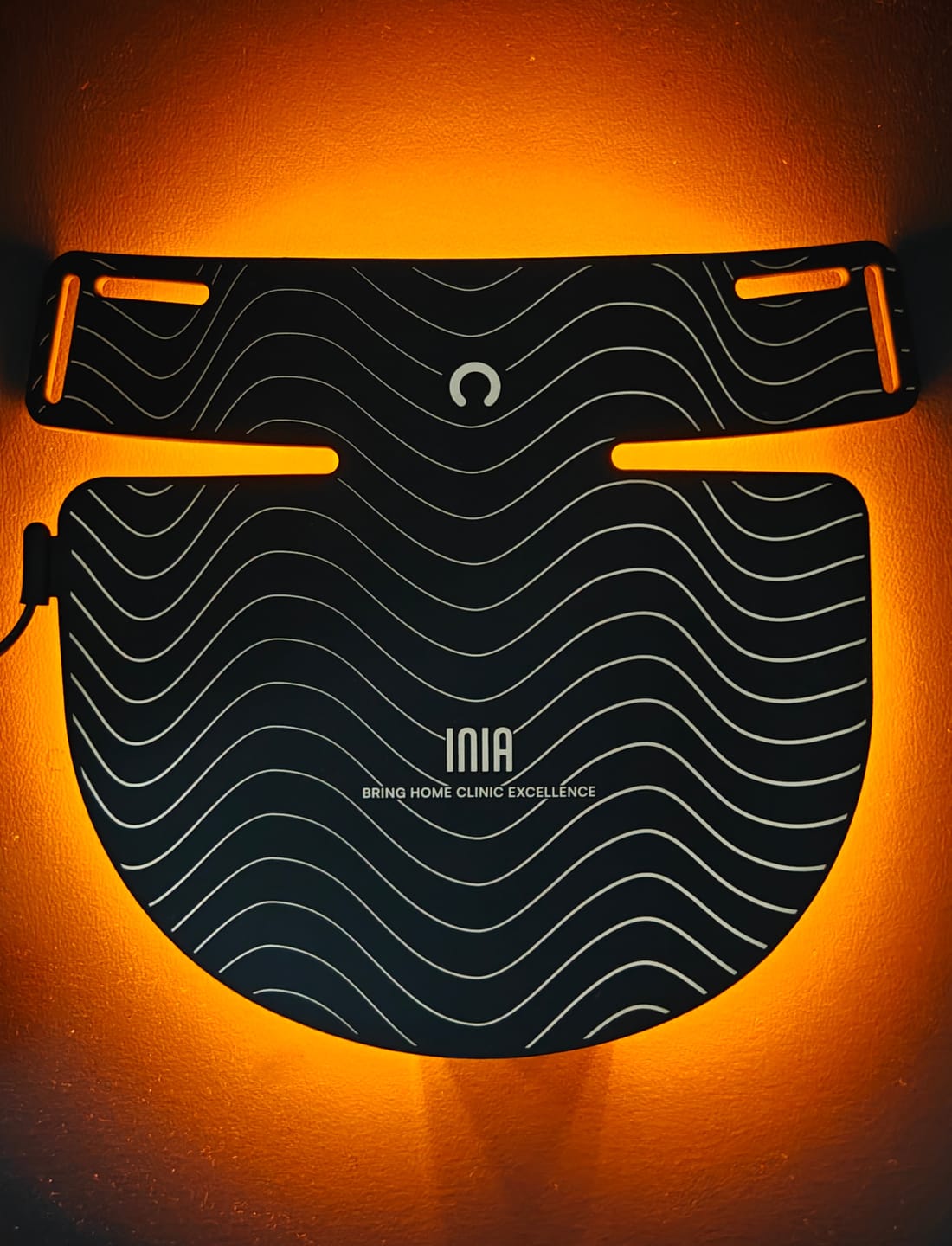 Customer photo review of INIA GLOW Neck & Chest Red Light Therapy