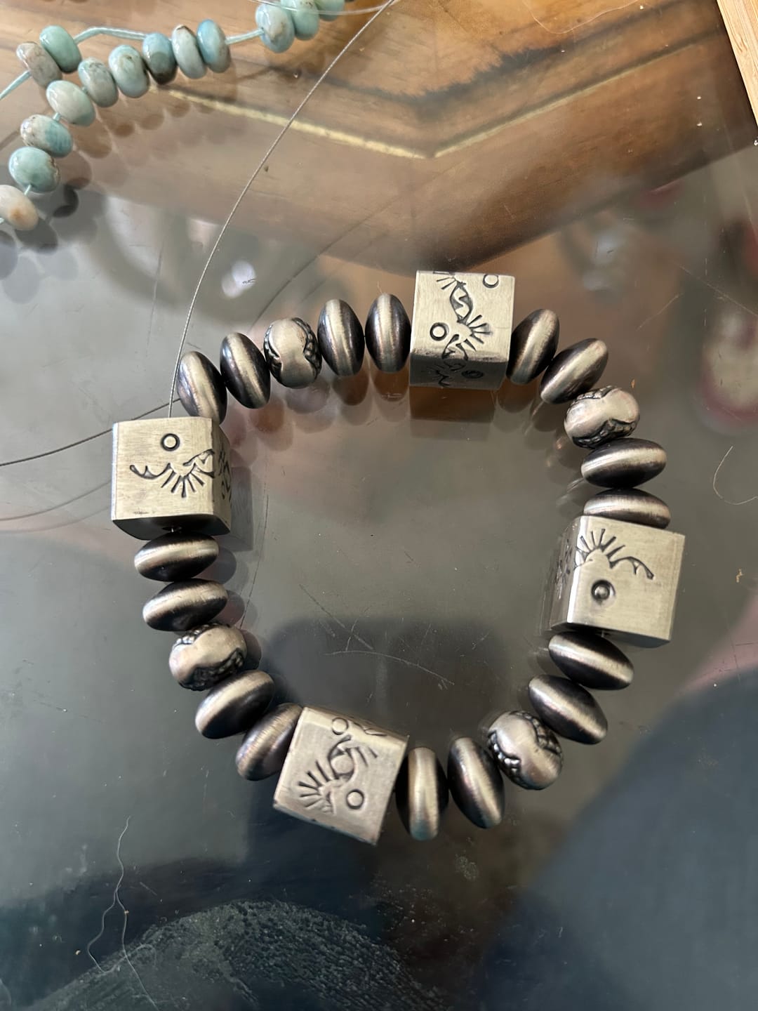 Customer photo review of Navajo Made Sterling Silver Stamped Cube Bead
