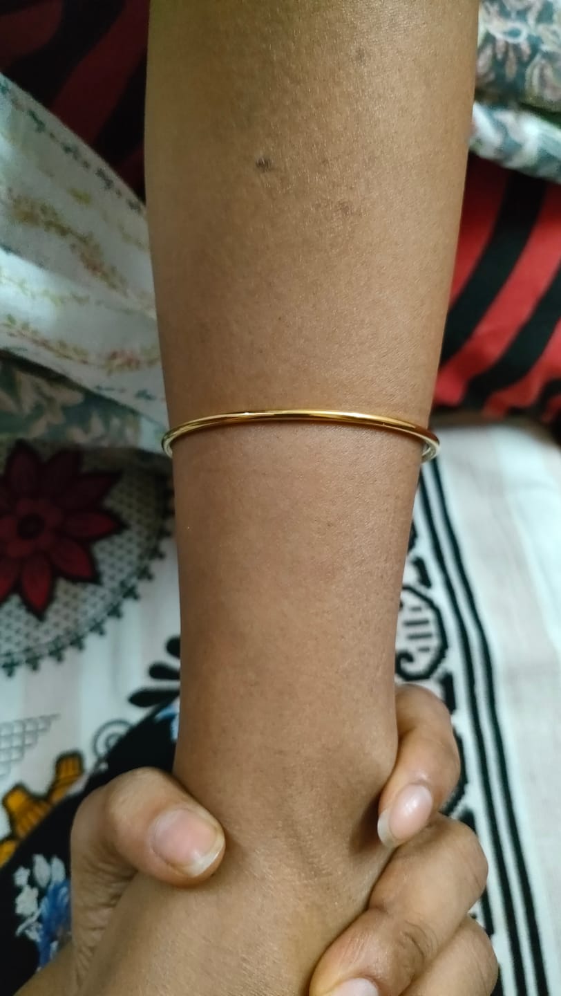 Customer photo review of Slim Gold Bangle