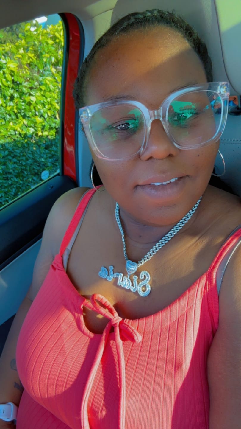 Customer photo review of LUXIIVA® CURSIVE FONT ICED OUT-BAGUETTE CUSTOM NAME PENDANT