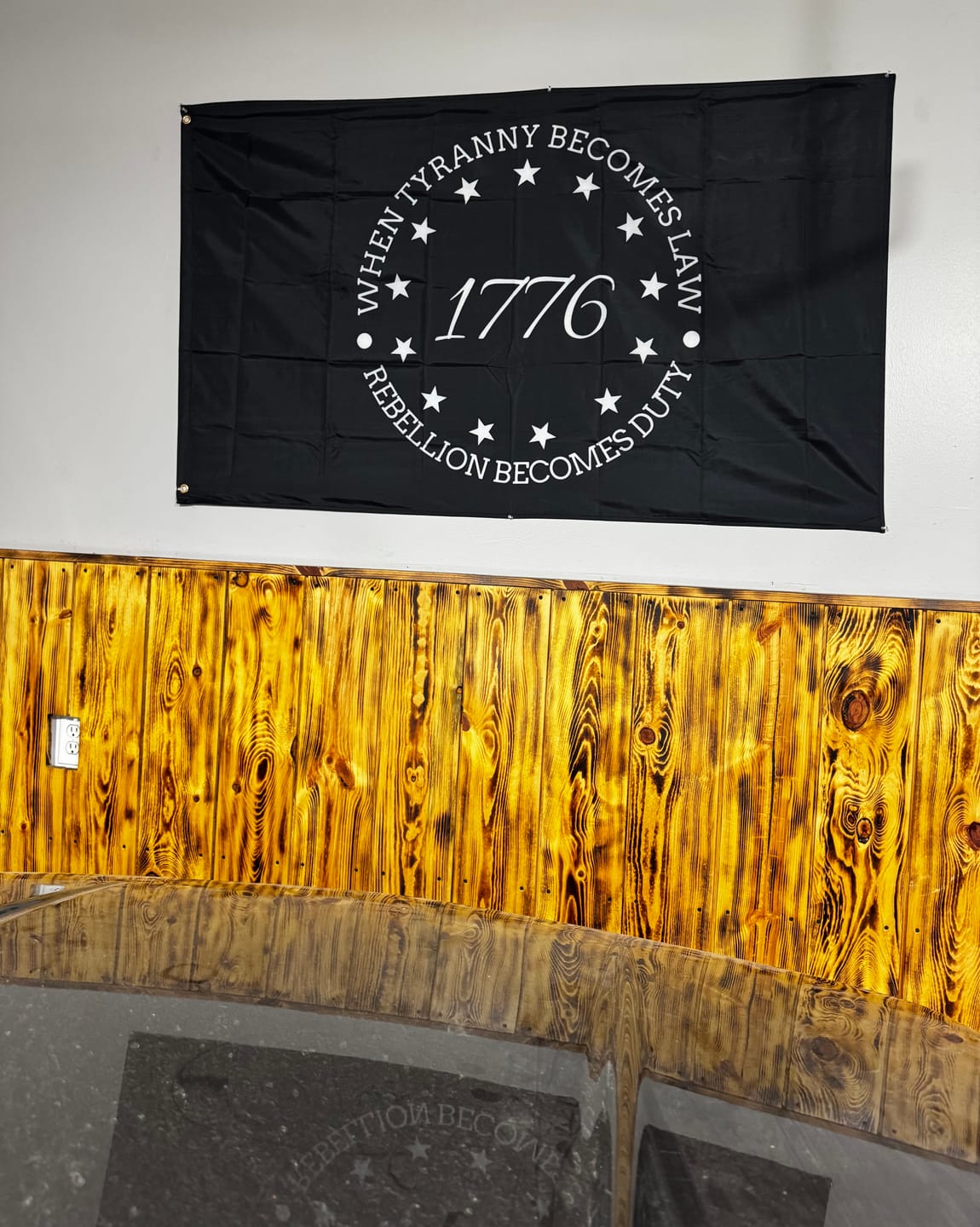 Customer photo review of When Tyranny Becomes Law Flag
