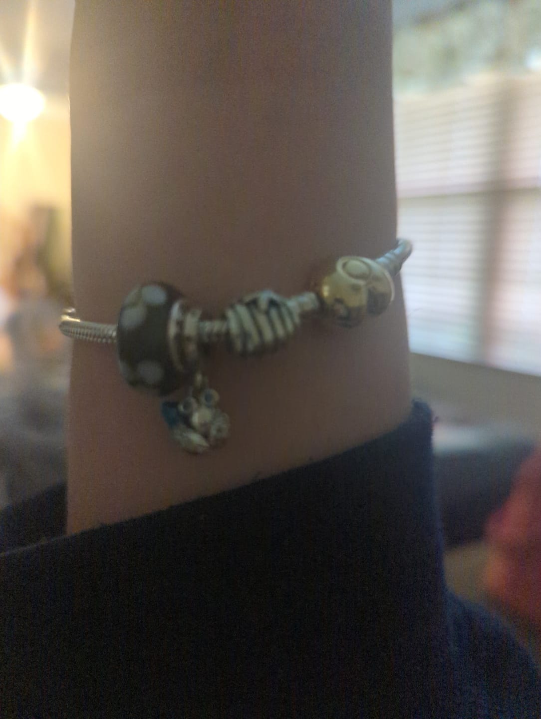 Customer photo review of PANDORA Black With White Flowers Murano Glass Sterling Silver Charm
