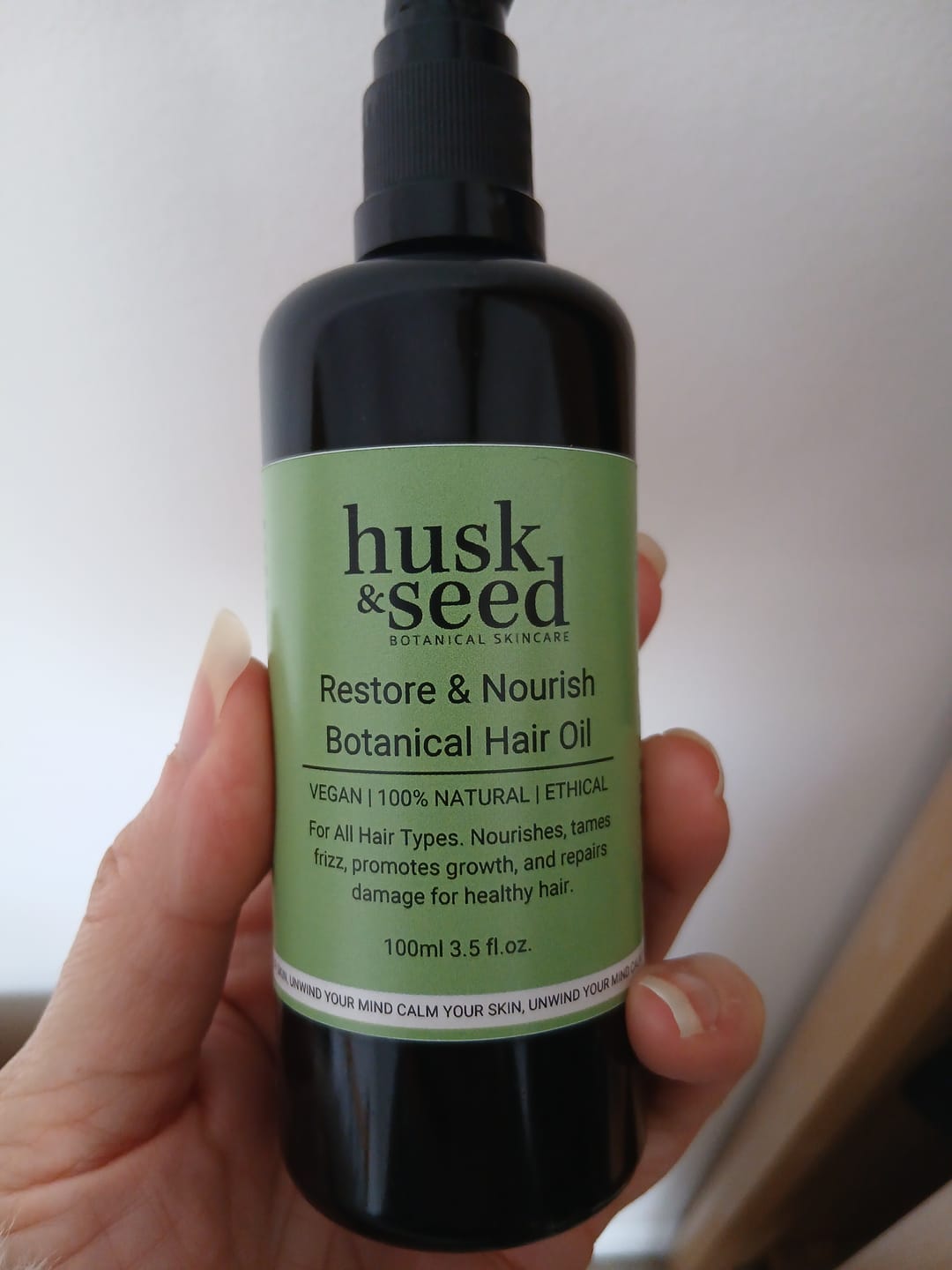 Customer photo review of Restore & Nourish Botanical Hair Oil
