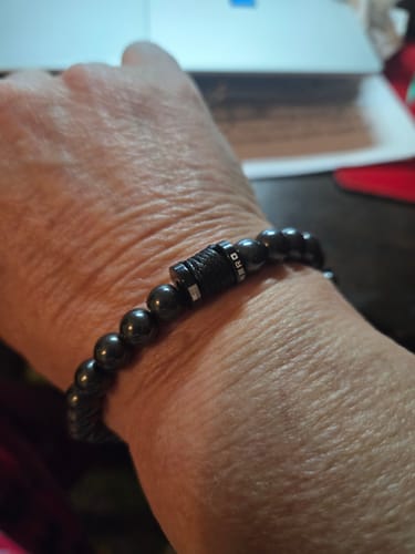 Customer photo review of 00 Buck Magnetic Hematite Titanium Bracelet : Helps Pair Veterans With A Service Dog Or Shelter Dog