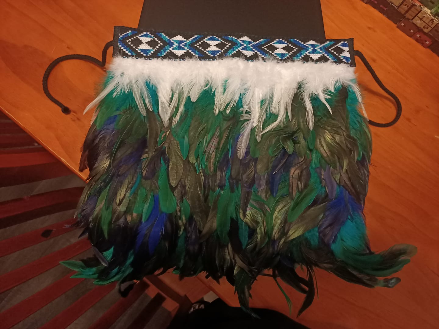 Customer photo review of Paua Blue Newborn Maori Baby Korowai