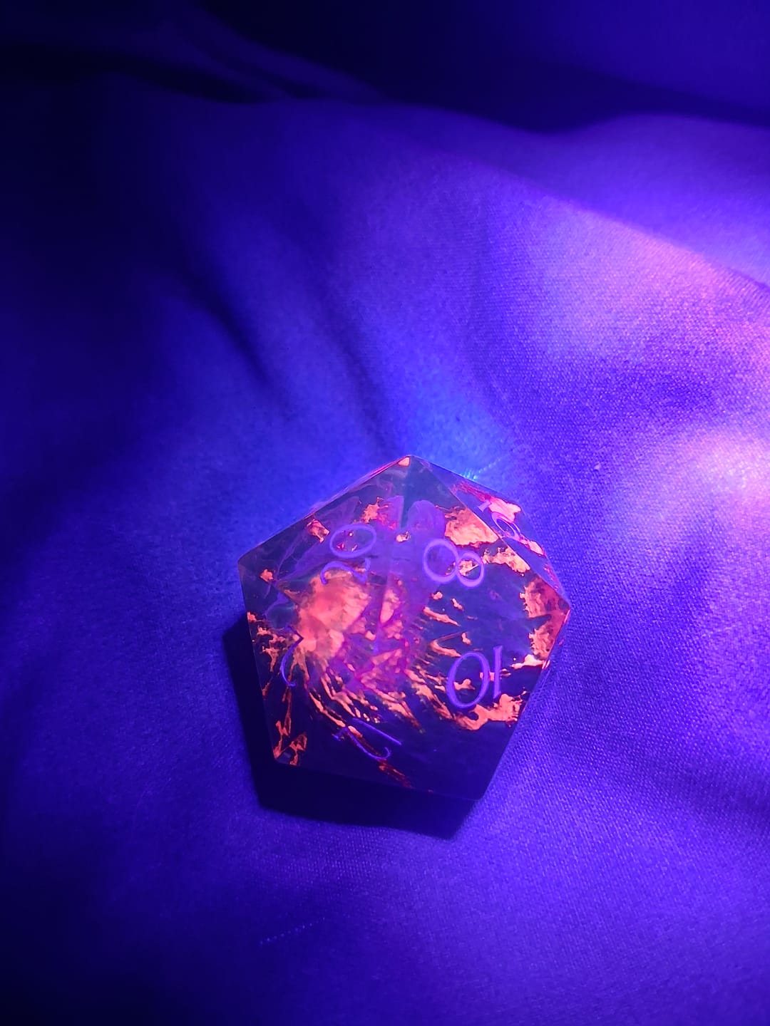 Customer photo review of URWizards D&D Resin Engraved Dice Set Mysterious Realm - Glowing Death Volcano