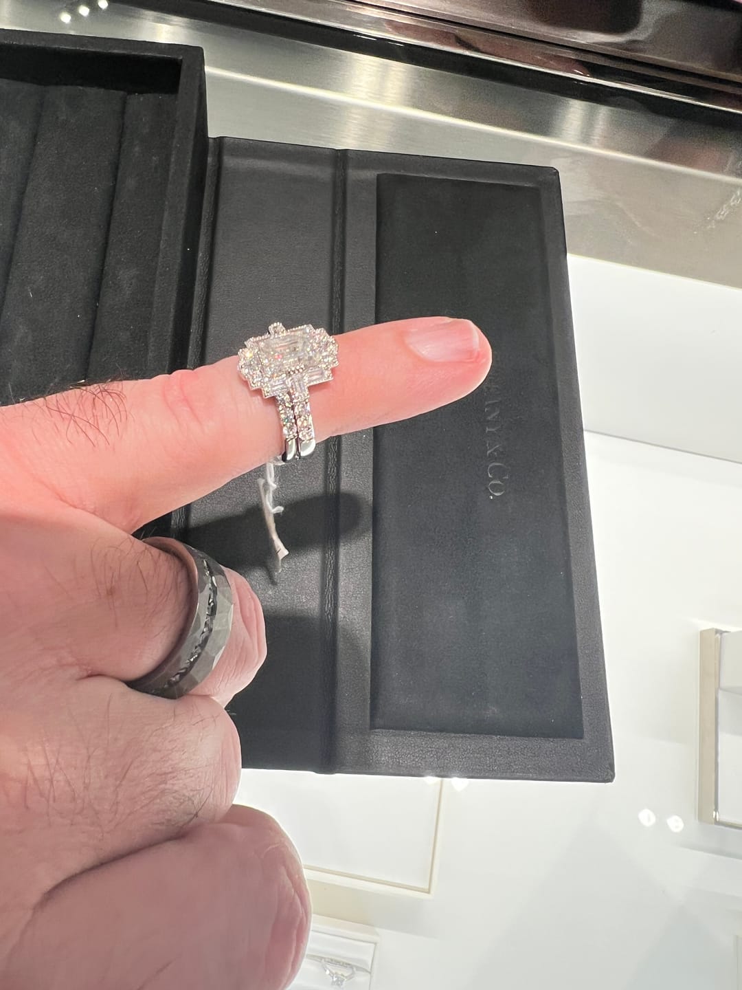 Customer photo review of Art Deco Emerald Cut Moissanite Milgrain Engagement Ring