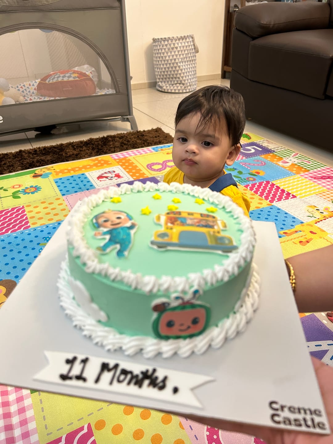 Customer photo review of Cocomelon photo cake