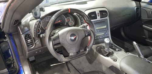 Customer photo review of Genuine Carbon Fiber Steering Wheel With Button Trim For C6 Corvette 2006-2011