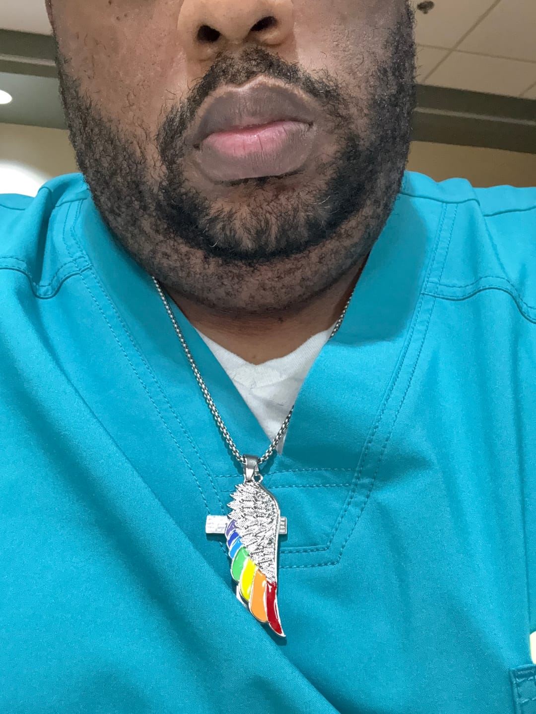 Customer photo review of Rainbow Angel Wing Necklace