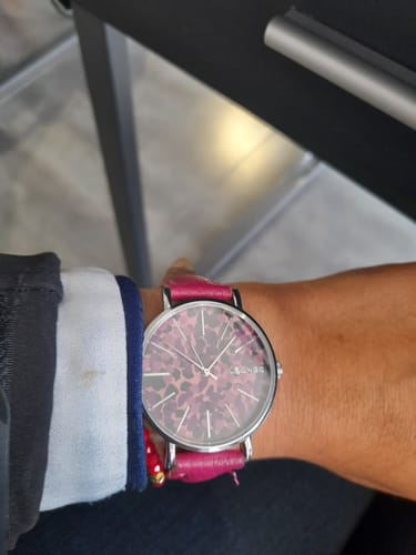 Reseña con foto de un cliente sobre Reloj Animal Print